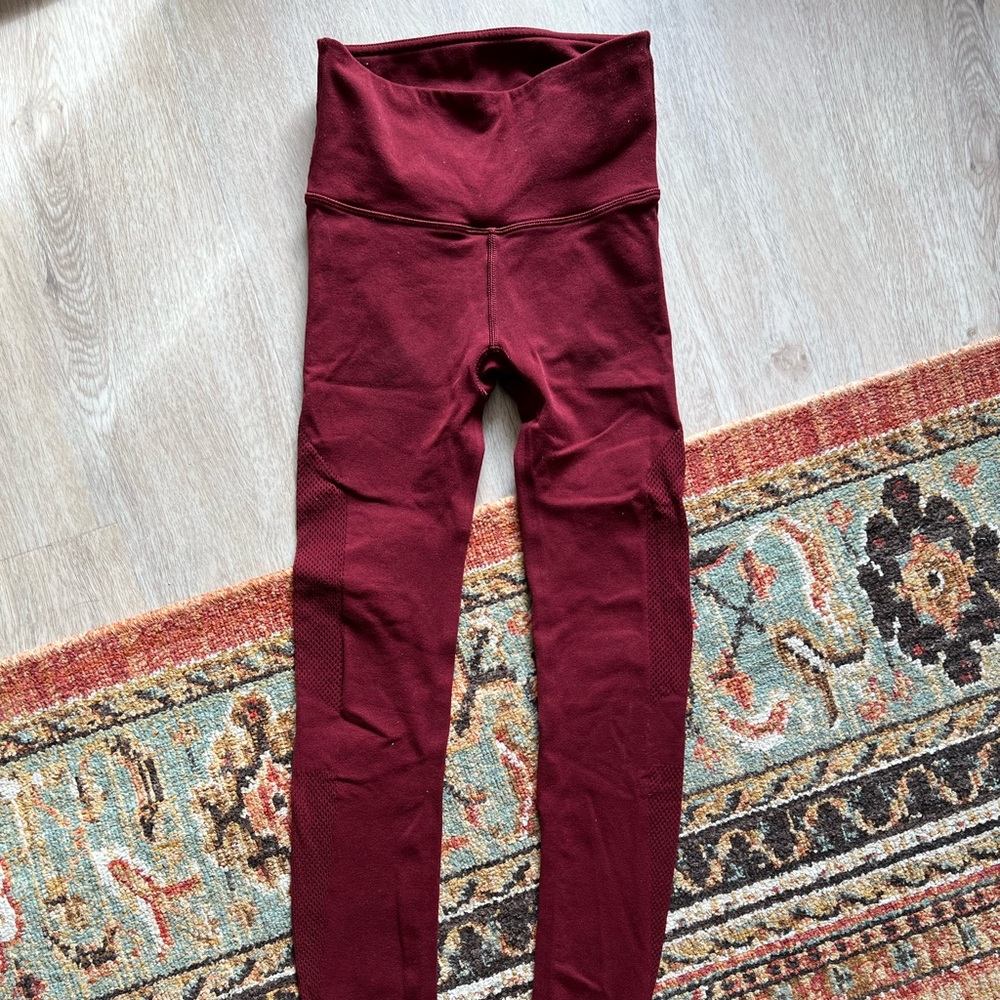 Red laser cut Lululemon leggings